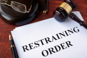 What Consequences Can You Expect if You Violate a Restraining Order?